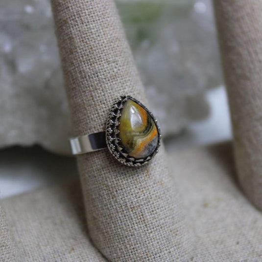 Unique Bumblebee Jasper gemstone ring, sterling silver setting, tear drop design, ring display stand