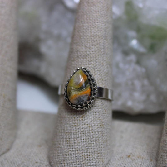 Unique Bumblebee Jasper gemstone ring, sterling silver setting, tear drop design, ring display stand