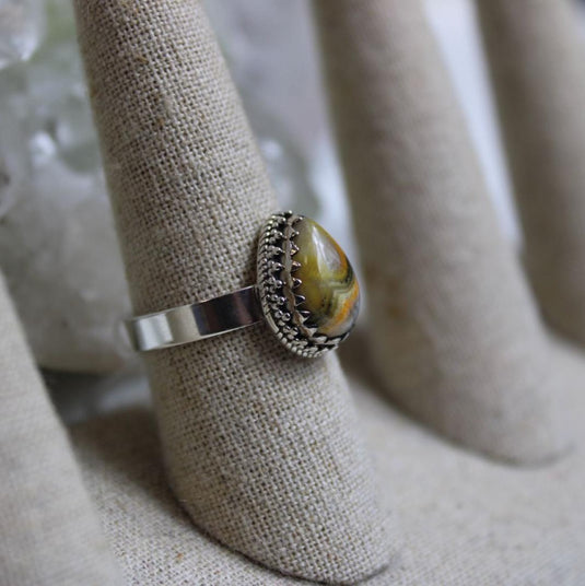 Unique Bumblebee Jasper gemstone ring, sterling silver setting, tear drop design, ring display stand