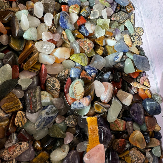 A close up view of the crystal confetti basket & scooper at Keshet Crystals