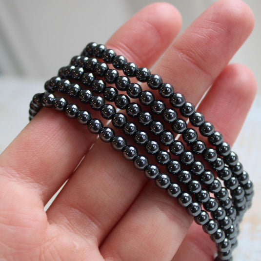 Hematite 4mm Bead Bracelets Stacked on Hand