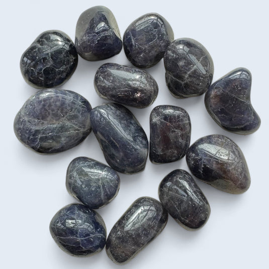 Iolite on Blue Background - Tumblestones - Keshet Crystals in Petersfield