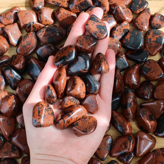 Mahogany Obsidian in Hand - Tumblestones - Keshet Crystals in Petersfield