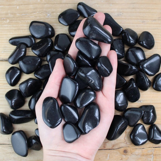 Black Obsidian in Hand - Tumblestones - Keshet Crystals in Petersfield