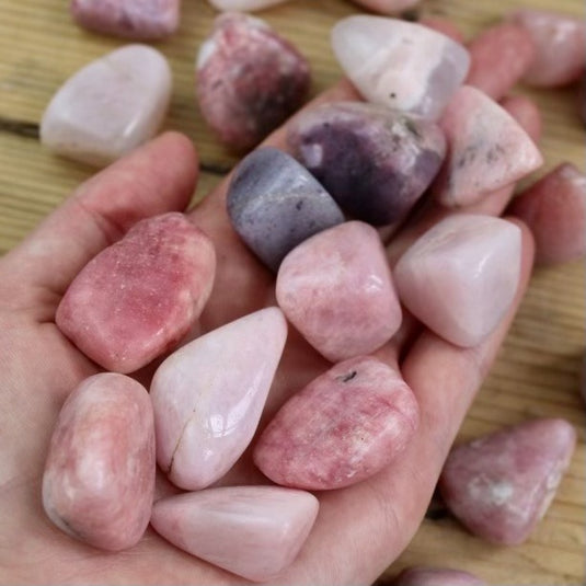 Pink Petalite in Hand - Tumblestones - Keshet Crystals in Petersfield