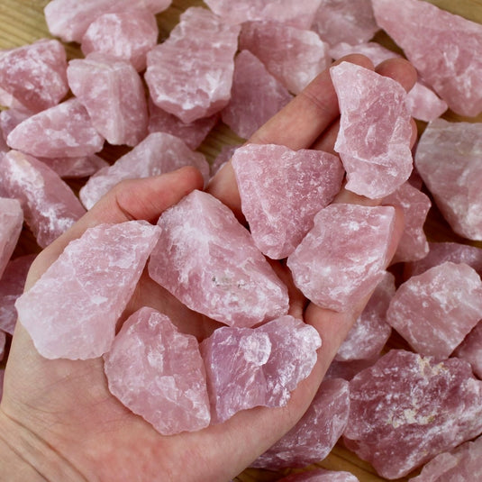 Raw Rose Quartz In Hand - Rough Crystals - Keshet Crystals in Petersfield