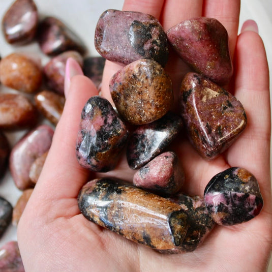 Rhodonite in Hand - Tumblestones - Keshet Crystals in Petersfield