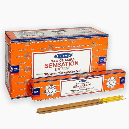 An orange box of sensation satya incense sticks