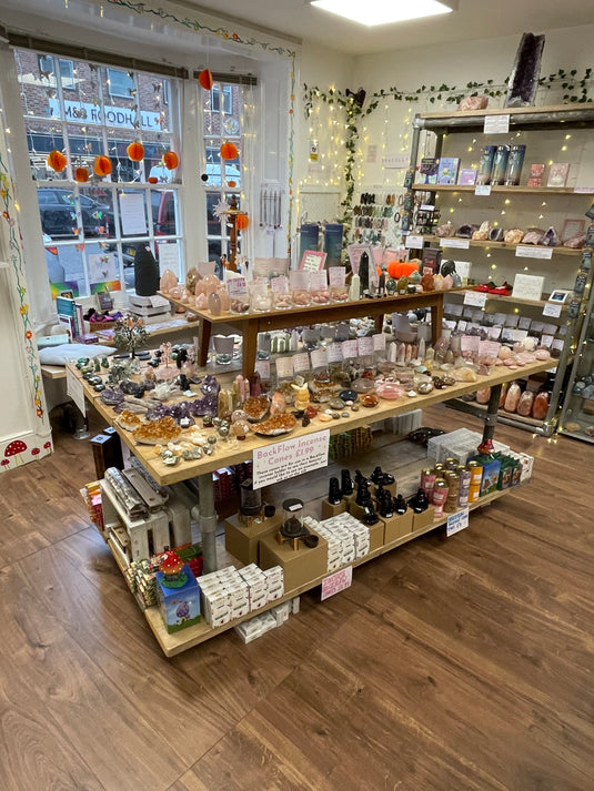 Image of displays of products inside of Keshet Crystals Shop. 
